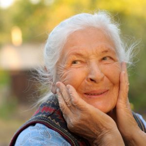 Portrait of the laughing elderly woman